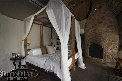 The master bedroom at Boulders featured a wood burning fireplace