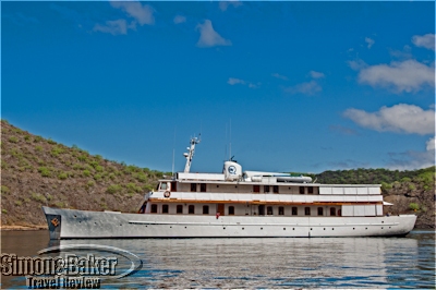 The M/Y Grace at anchor in a secluded cove of the Galapagos archipelago