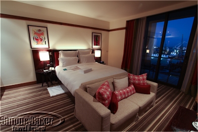 Sleeping and sitting areas in the spacious room