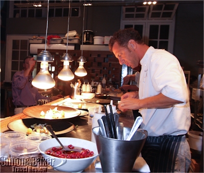 Luke Dale-Roberts preparing plates at the Test Kitchen