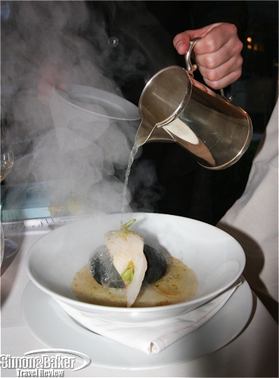 Fillet of John Dory on the hot stone from "St. Pere" prepared at the table 