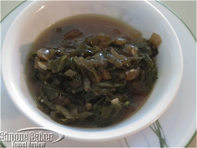 Collard greens cooked in beef broth